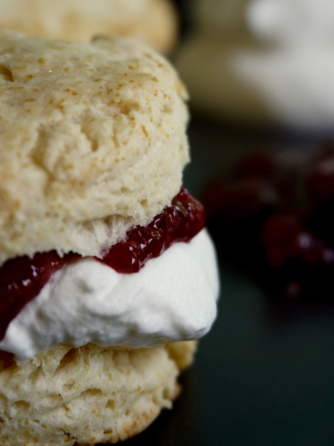 An Irish scone filled with whipped cream and jam